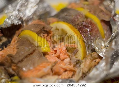 The baked trout with lemon on foil