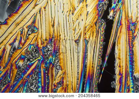 colorful microscopic shot of Sodium nitrate microcrystals in polarized light