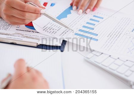 Businesswoman Holding A Silver Pen In Her Hand