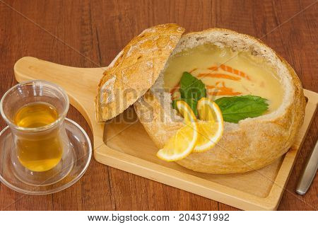 Soup In A Bread Bowl On The Board