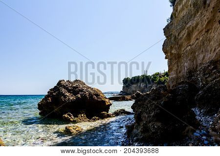 Coastal erosion of the cliffs is created by wind and rain erosion.
