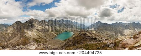 Alpine lake Velke Hincovo Pleso from Slavkovsky stit, with a great view on High Tatra mountains.