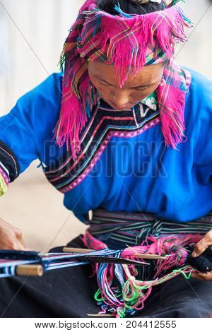 Phongsali Laos - July 25 2010: Hilltribe woman of ethnic group 