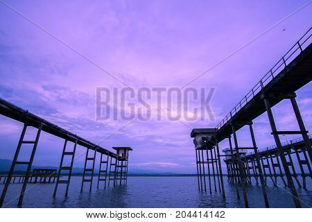 The long bridge on reservoir Chonburi Thailand.