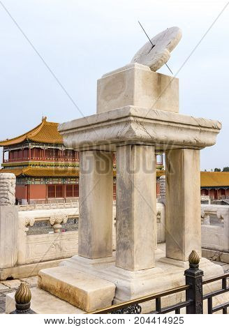 Beijing, China - Oct 30, 2016: The sundial, an ancient time calculagraph, at the Hall of Supreme Harmony (Taihedian). Forbidden City (Gu Gong, Palace Museum).