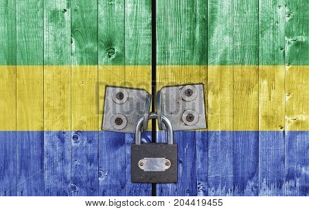 Gabon flag on door with padlock close