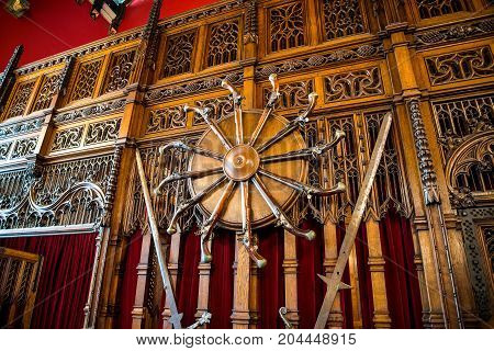Pistols on one of the walls inside of Great Hall at Edinburgh Castle Scotland