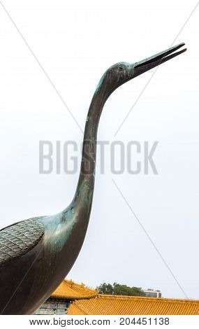 Beijing, China - Oct 30, 2016: Copper crane at closeup, one of a pair, at the Hall of Supreme Harmony (Taihedian), Forbidden City (Gu Gong, Palace Museum).
