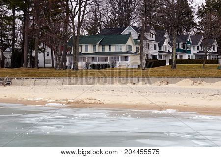 A view of beachfront homes on Beach Drive in Wequetonsing, Michigan, during March.