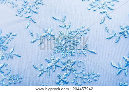 Blue guipure embroidery on cloth for wedding dress texture