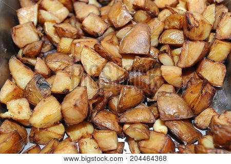 Fried potato and appetizer in pan for dinner