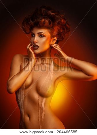 Voluptuous adult girl in bandage in studio