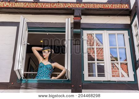 BREMEN, GERMANY - AUGUST 23, 2017: Mannequin in a window in the Schnoor district of Bremen Germany