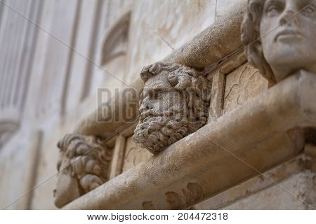 Sibenik cathedral / Famous faces on the side protal of Sibenik cathedral