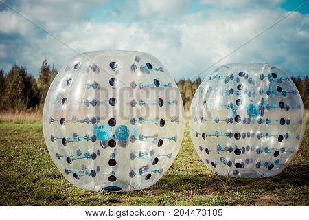 Bumper-balls For Soccer Playing On A Green Lawn, A New Funsport