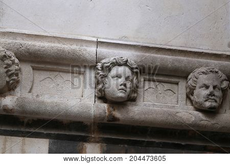Sibenik cathedral / Famous faces on the side protal of Sibenik cathedral