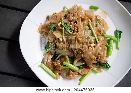 Fired Thin Noodles In Sweet Soy Sauce With Pork