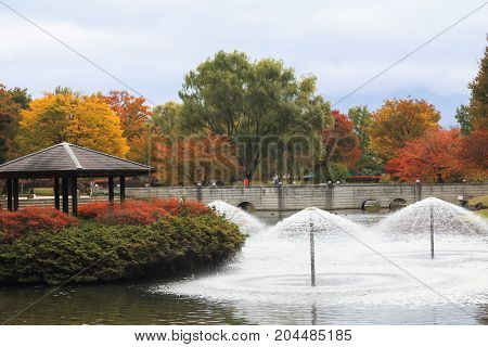 Japan autumn Fountain in soft focus and blur style Obuse park NaganoJapan.