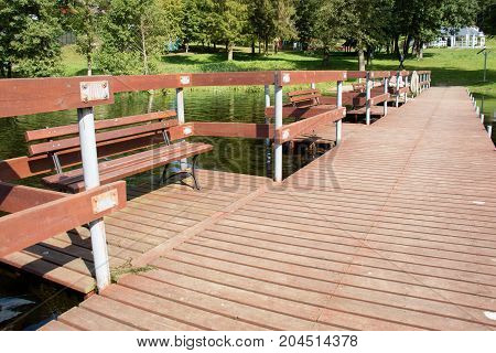 Bridge over the lake, river. Beautiful autumn season. September season.