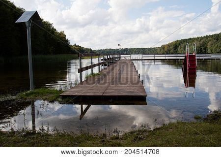 Bridge Over The Lake, River. Beautiful Autumn Season.