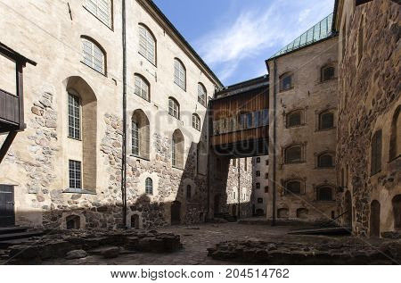 TURKU, FINLAND ON JUNE 30. Outdoor view of the Turku Medieval Castle from the 13th century on June 30, 2017 in Turku, Finland. Classical stone building. Editorial use.