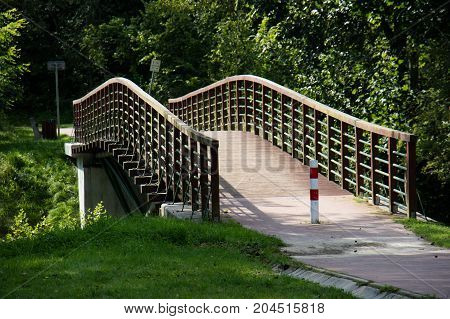 Bridge over the lake, river. Beautiful autumn season. September season.