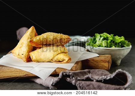 Asian Food. Vegetarian Samsa With Tomato Sauce And Herbs. Dark B