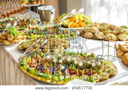 Delicacies and snacks at a buffet or Banquet. Catering. Selective focus.