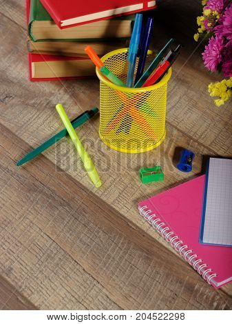 Back to school and education banner with colorful pencils and stationery.