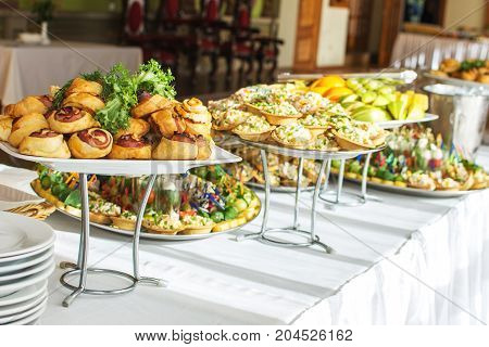 Delicacies and snacks at a buffet or Banquet. Catering. Selective focus.