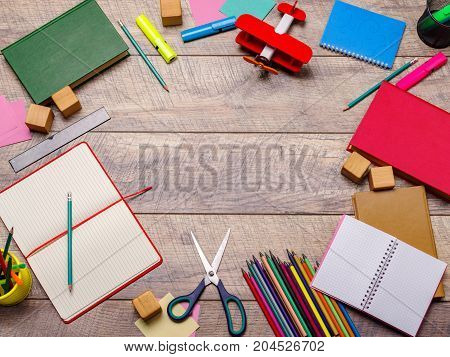 Back to school concepty with clear blackboard background, desk, items