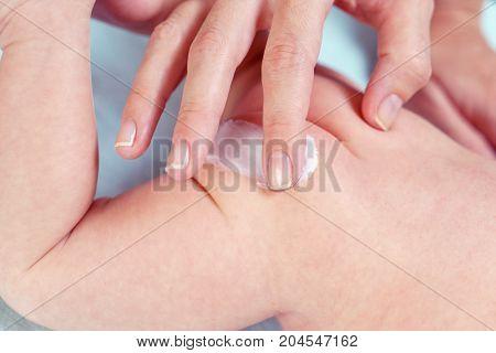 Mom Applying Some Cream By Her Hand To The Babby Ass