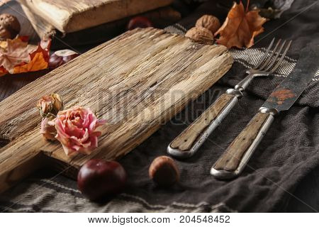Decoration Helluin. Autumn Card. Chestnuts On A Wooden Board, Wo