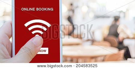 Online booking over blur restaurant background banner with copy space food and drink restauant reservation