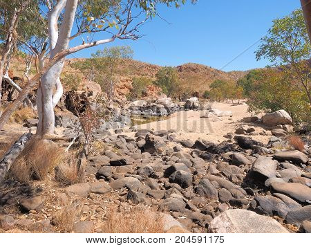 Water hole along the rim walk in the dry Ormiston Pound Northern Territory Australia 2017