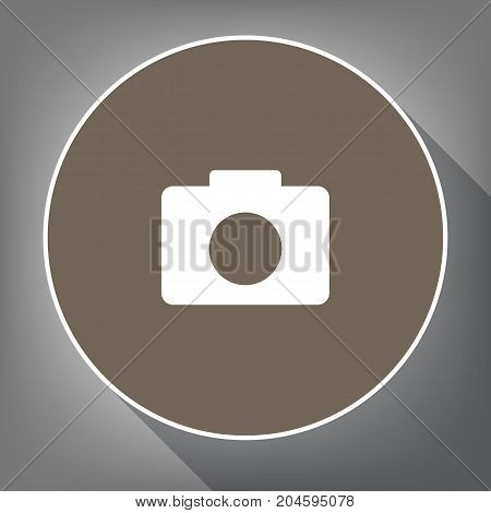Digital camera sign. Vector. White icon on brown circle with white contour and long shadow at gray background. Like top view on postament.