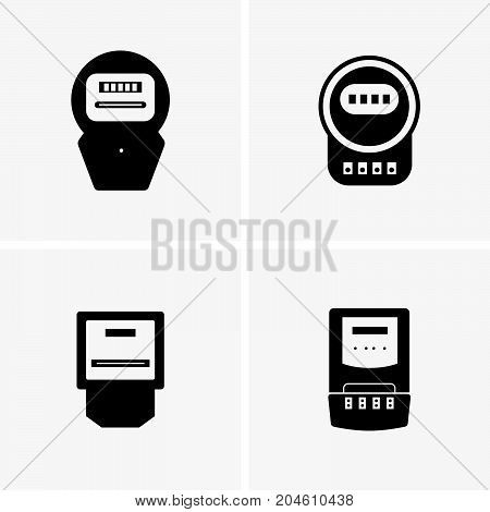 Set of four electric light meters on grey