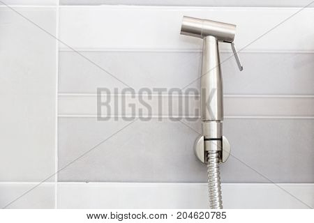 Modern design home bidet spray cleaning flush toilet in bathroom