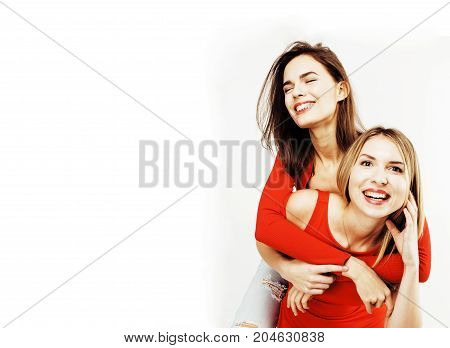 best friends teenage girls together having fun, posing emotional on white background, besties happy smiling, lifestyle people concept close up. making selfie
