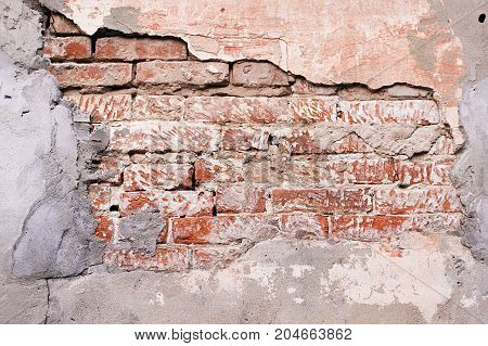 Old red brick frame in concrete. Grey