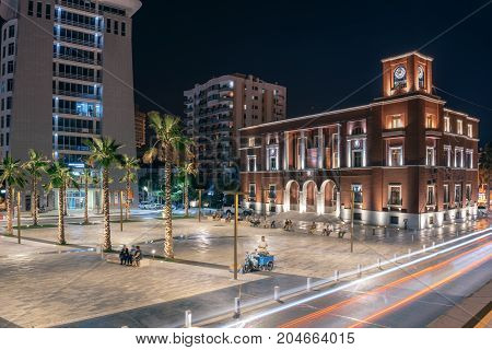 ALBANIA DURRES - September 22 2015: The evening main square of the city is the Illyrian (sheshi Iliria). New residential complex and city council are located on the square