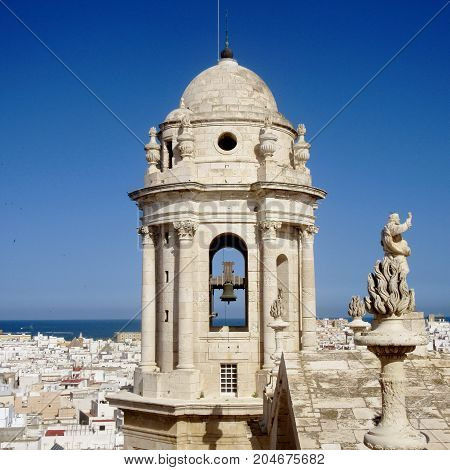 a close up on the bell tower of the church of cadiz (spain )