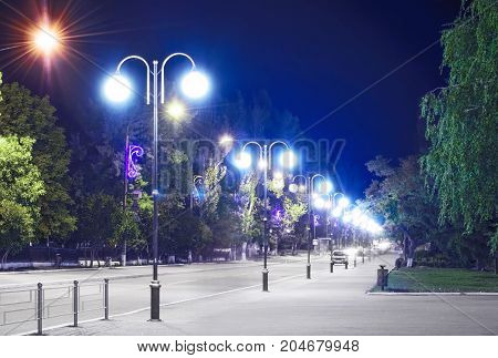 A lightened City street at night. Pokrov town, Ukraine