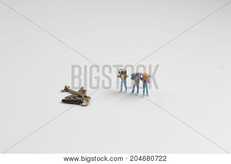 Min Hikers With Backpacks On The White Baord