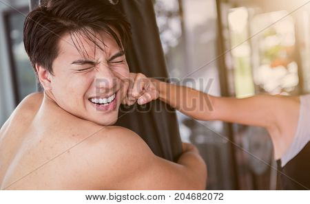 Asian boxer hit the face and boxing