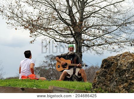 Austin, Texas - January 21, 2017: Musician performing in Zilker Metropolitan Park, Austin, Texas.