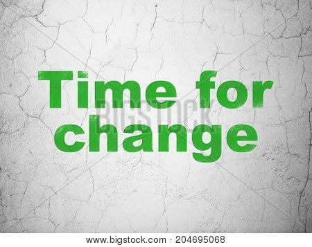 Time concept: Green Time For Change on textured concrete wall background