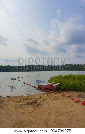 Boat By A Lake