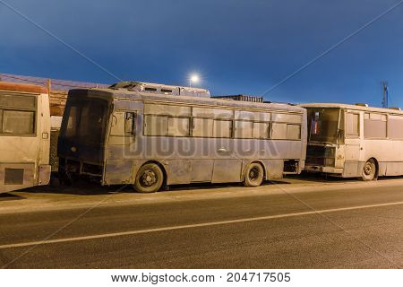 abandoned transport metropolis, traffic and blurry lights of cars on the highway and multiband dense road traffic at night in Moscow
