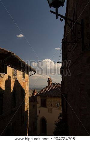 The village of Etruscan origins is named Cortona and is located in Tuscany Italy.
